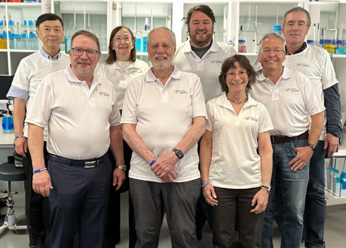 Researchers standing in a laboratory