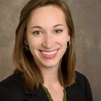 Professional headshot of Danielle Meadows smiling at the camera.